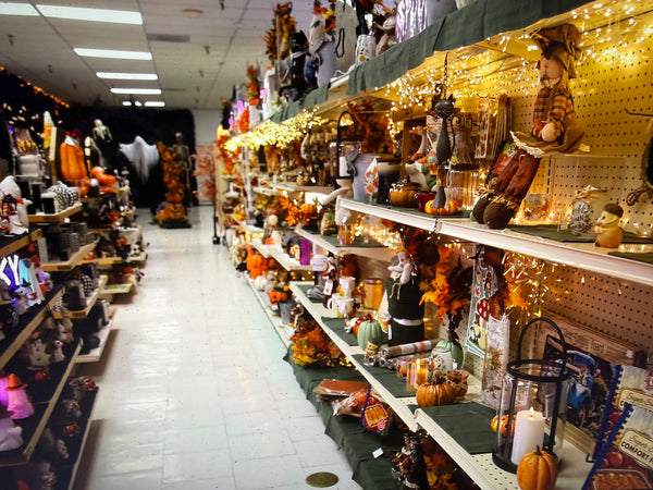 Gift aisle at Mahaska Drug, shelves filled with seasonal decor and gifts