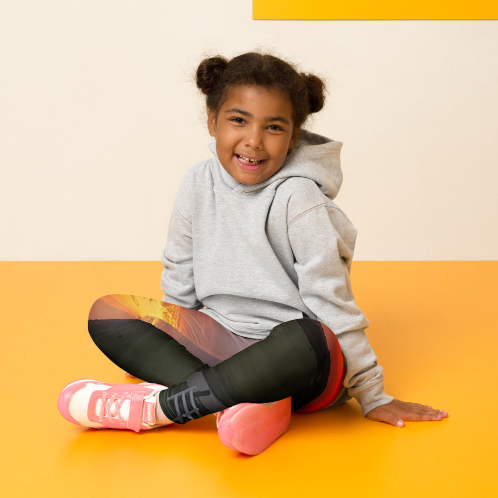 Photo Kids Leggings worn with an Iowa sunset photo printed on it