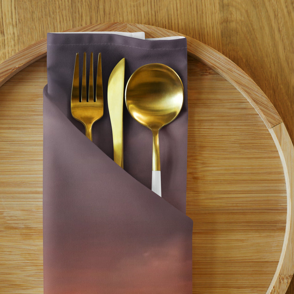 Cloth Napkin Set (4) shown with an Iowa sunset photo printed on each piece