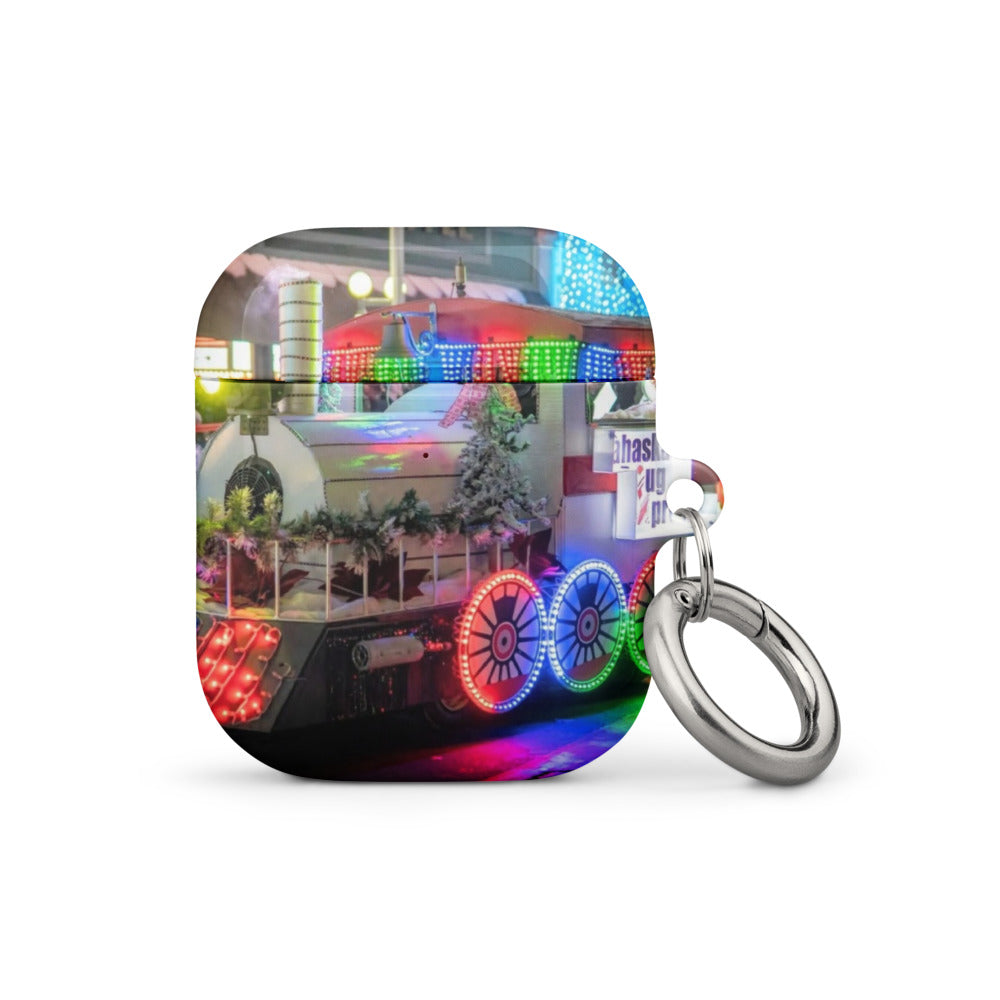 Front of a custom AirPods case printed with a customer photo, with a metal carabiner attached