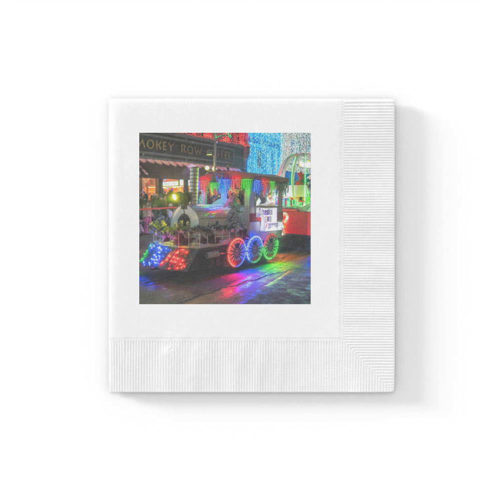 Stack of white coined-edge paper napkins printed with a customer photo