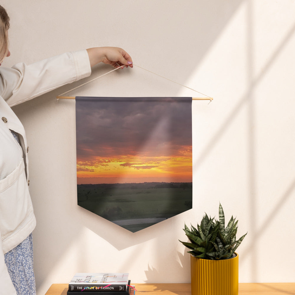 Wall Pennant shown with an Iowa sunset photo printed on it