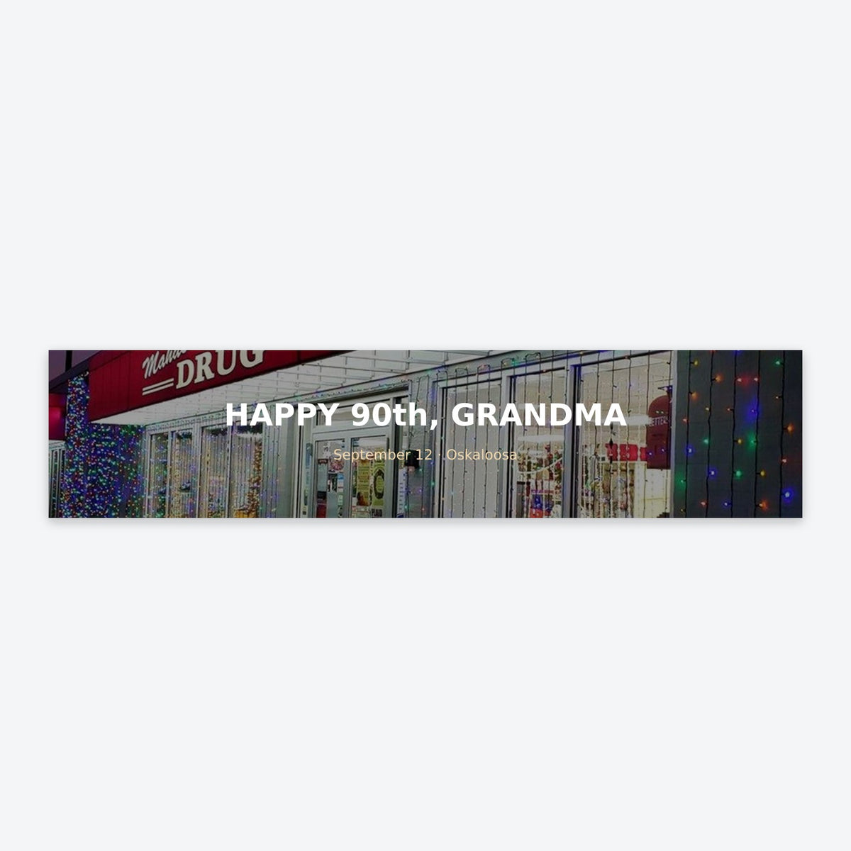 A printed photo banner with a message