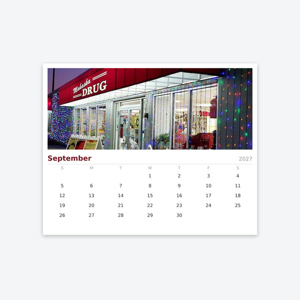 A twelve-month photo wall calendar, one month shown