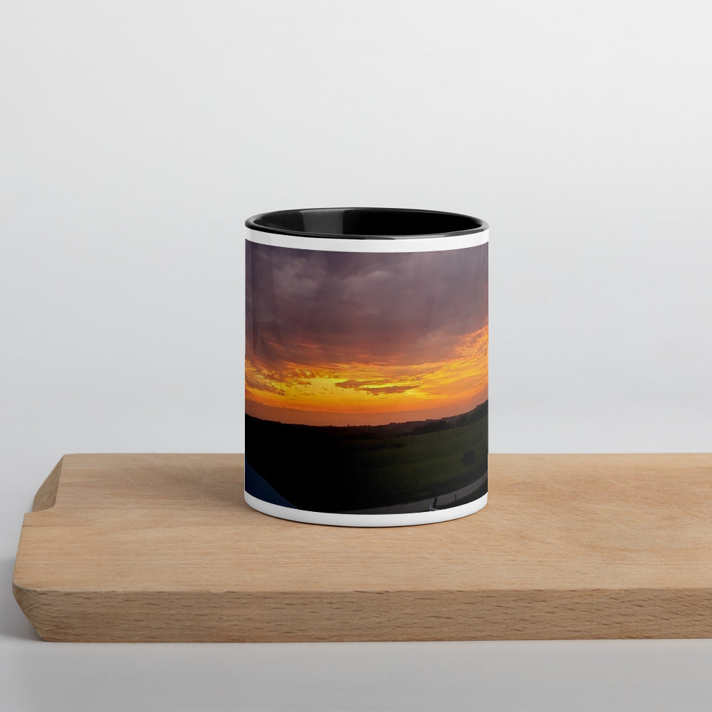 Mug with Color Inside shown with an Iowa sunset photo printed on it