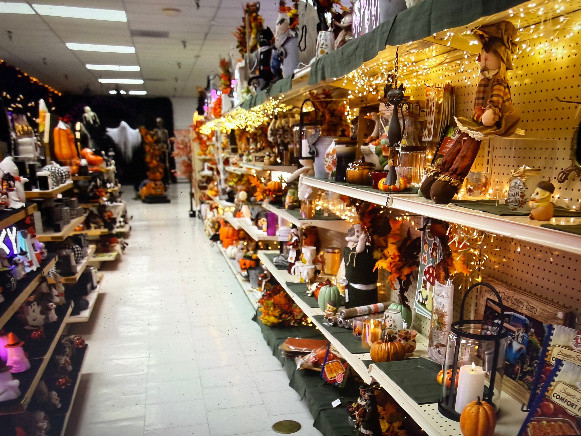 Gift aisle at Mahaska Drug, shelves filled with seasonal decor and gifts