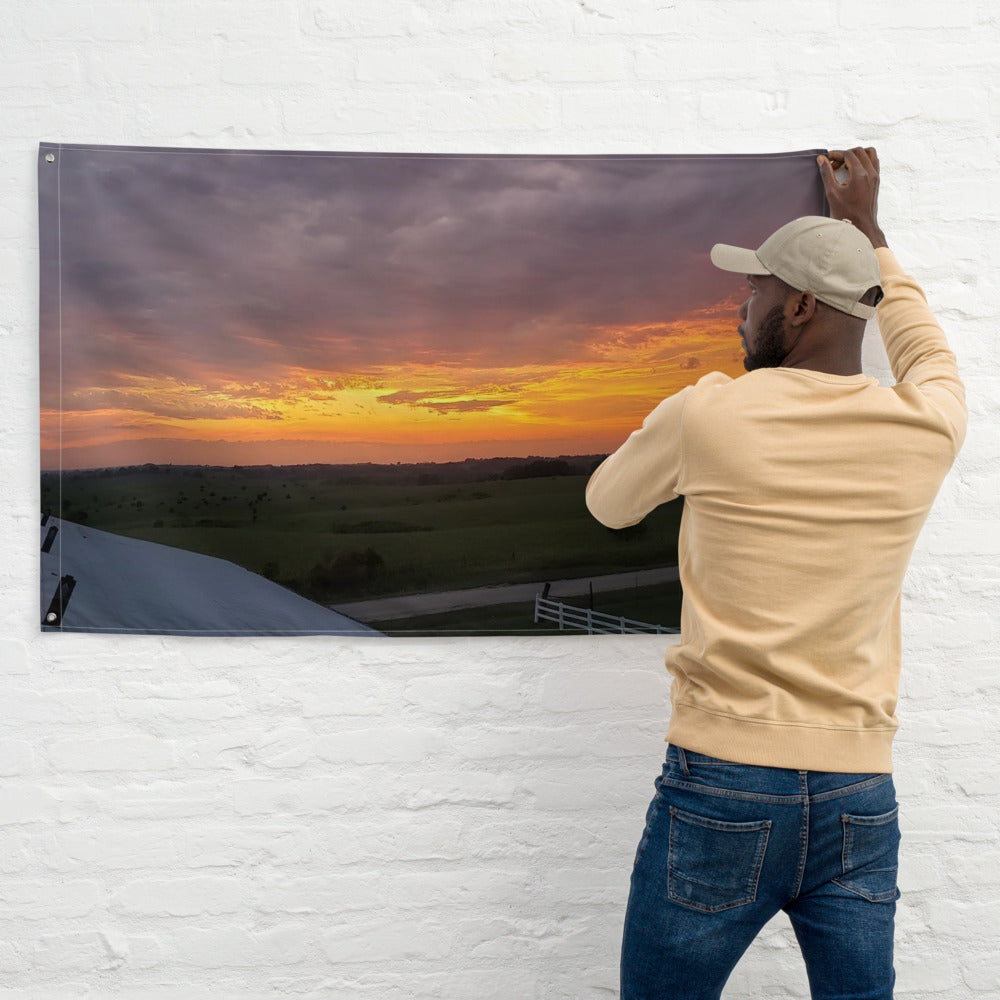 Photo Wall Flag shown with an Iowa sunset photo printed on it