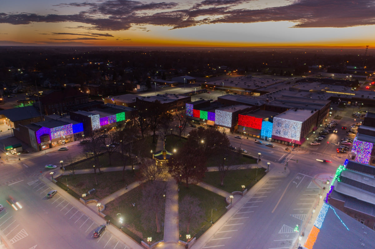 Aerial view of Oskaloosa's City Square Park lit up at dusk for Painting with Lights