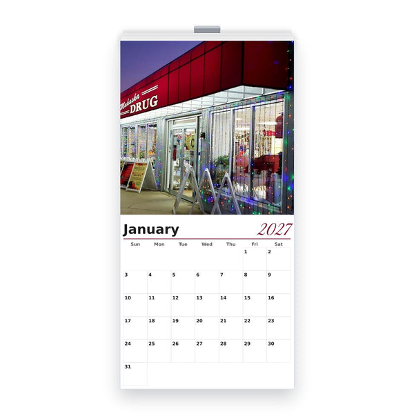 Photo Wall Calendar — thirteen 12x24 sheets stapled at the top, January shown